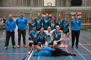 u15 girls team on tour with staff